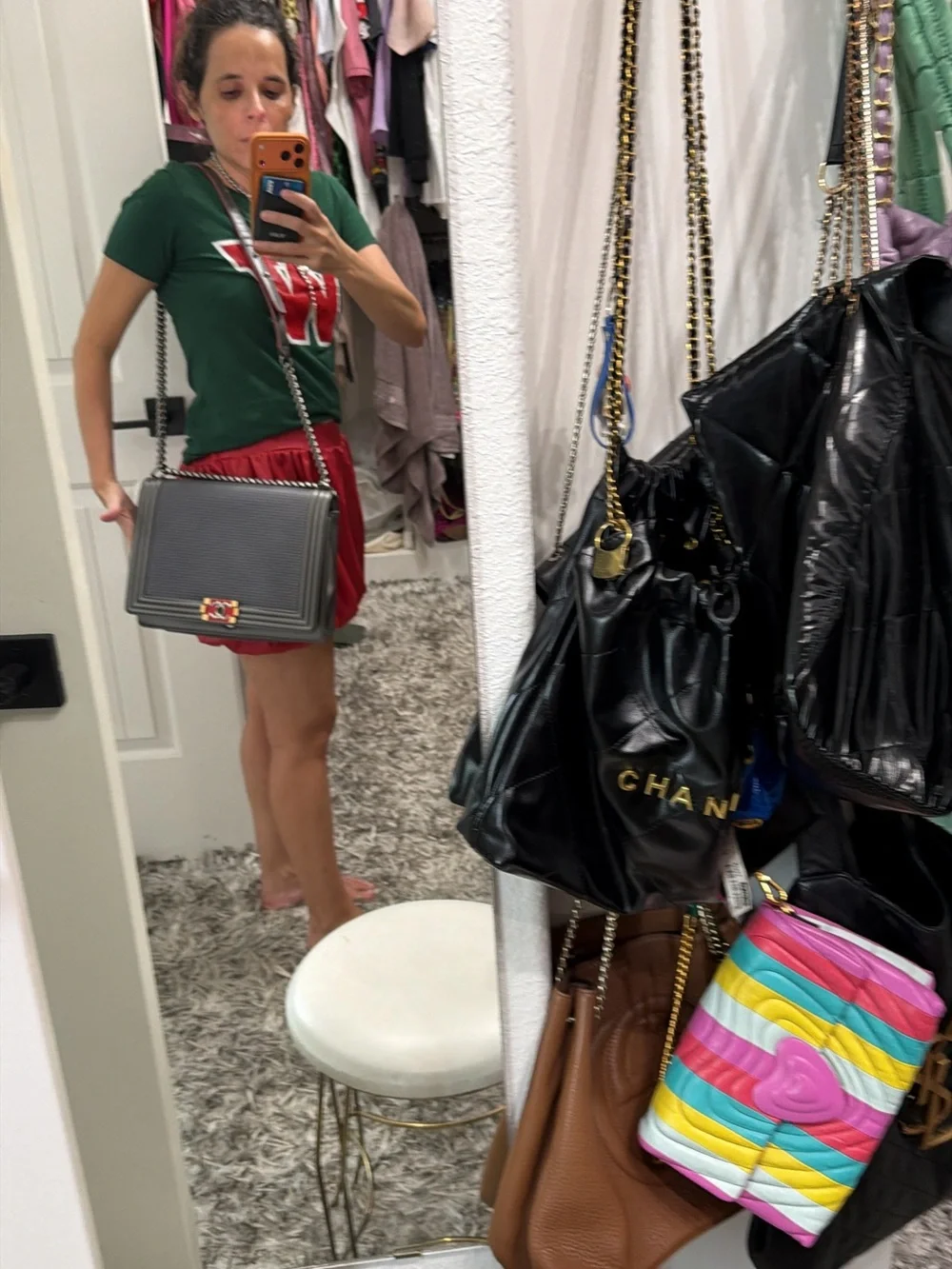 CHANEL Textured Gray Messenger Bag with Chain Strap and Red Accent XXL